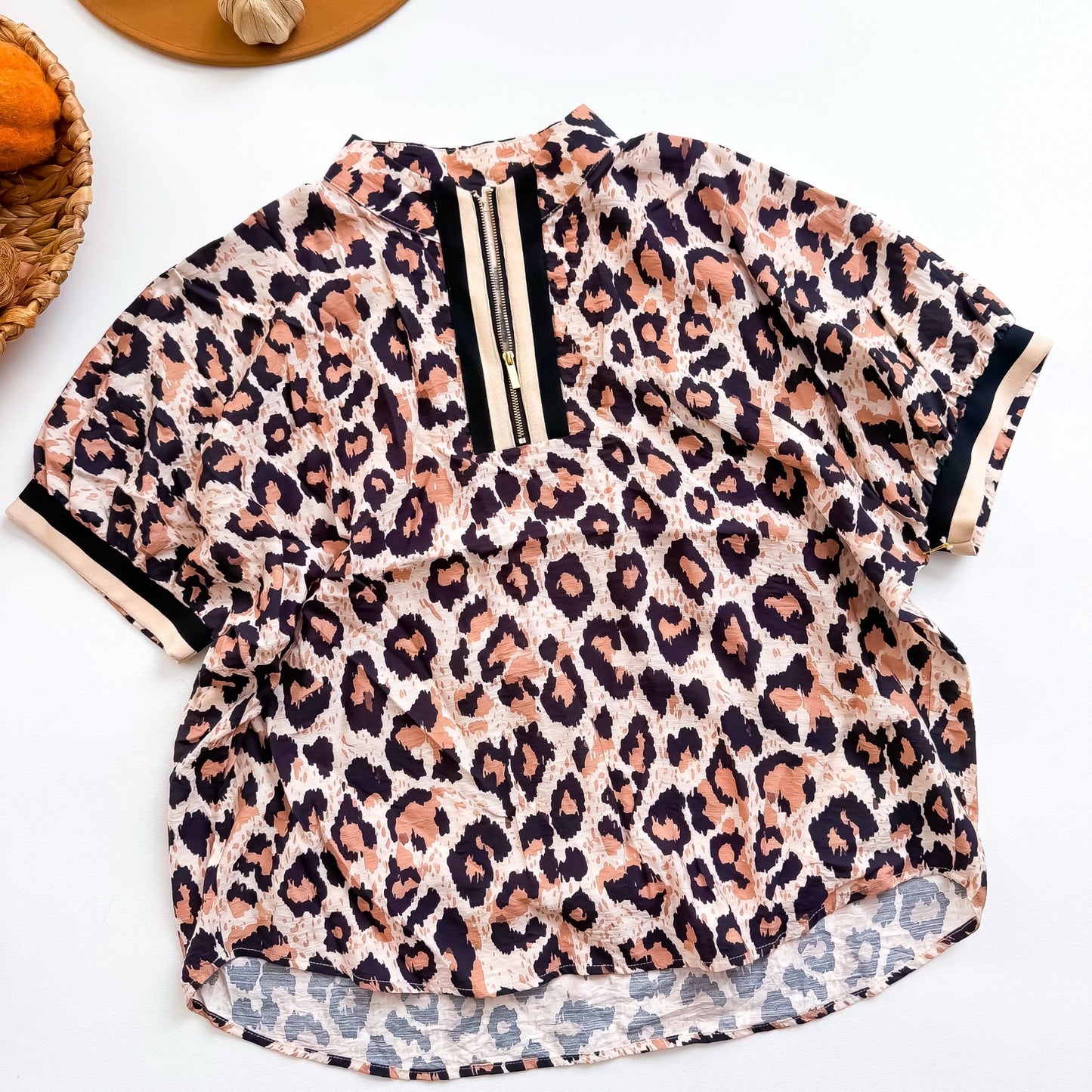 Cheetah Chic Quarter Zip Stripe Trim Top