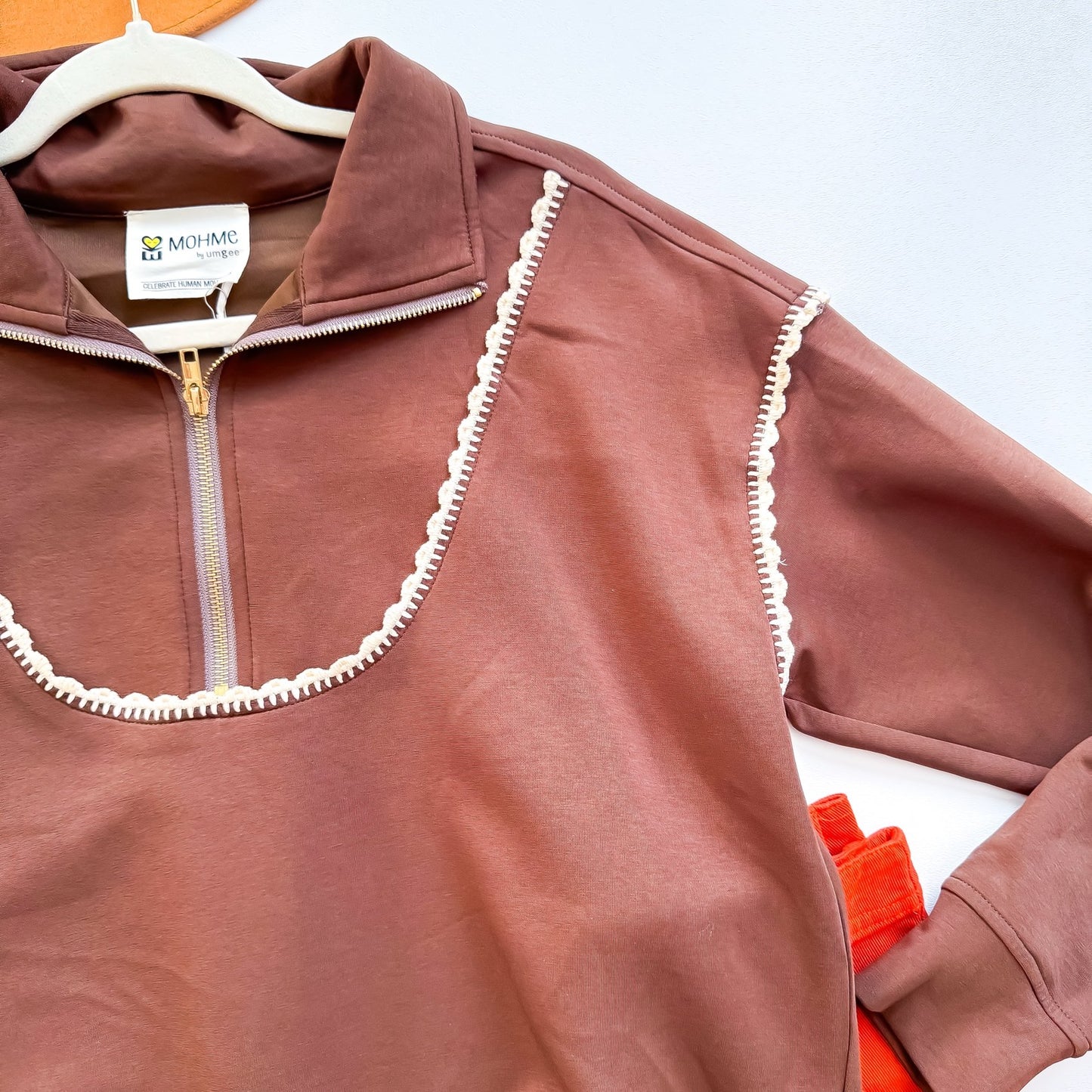 Cocoa quarter zip crochet trim detail