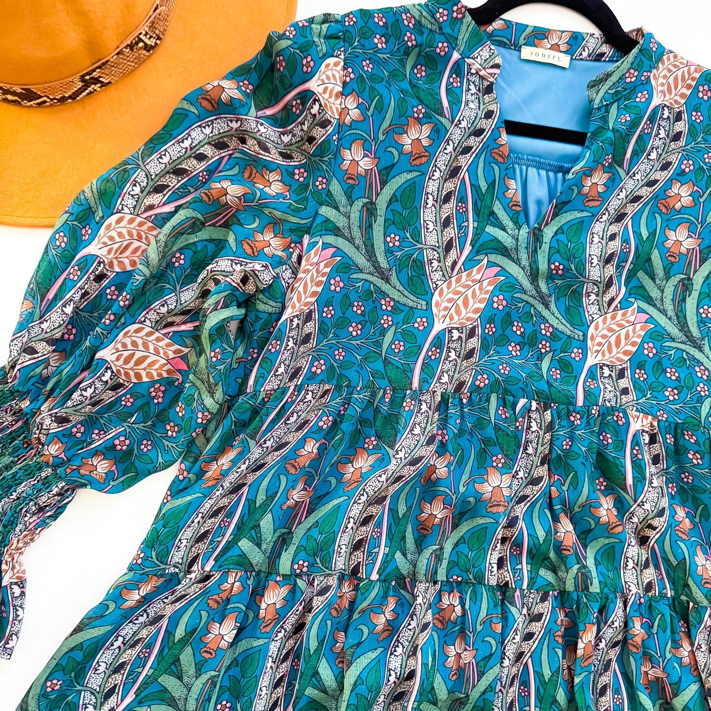 Peacock Garden Smocked Cuff Tiered Mini Dress detail