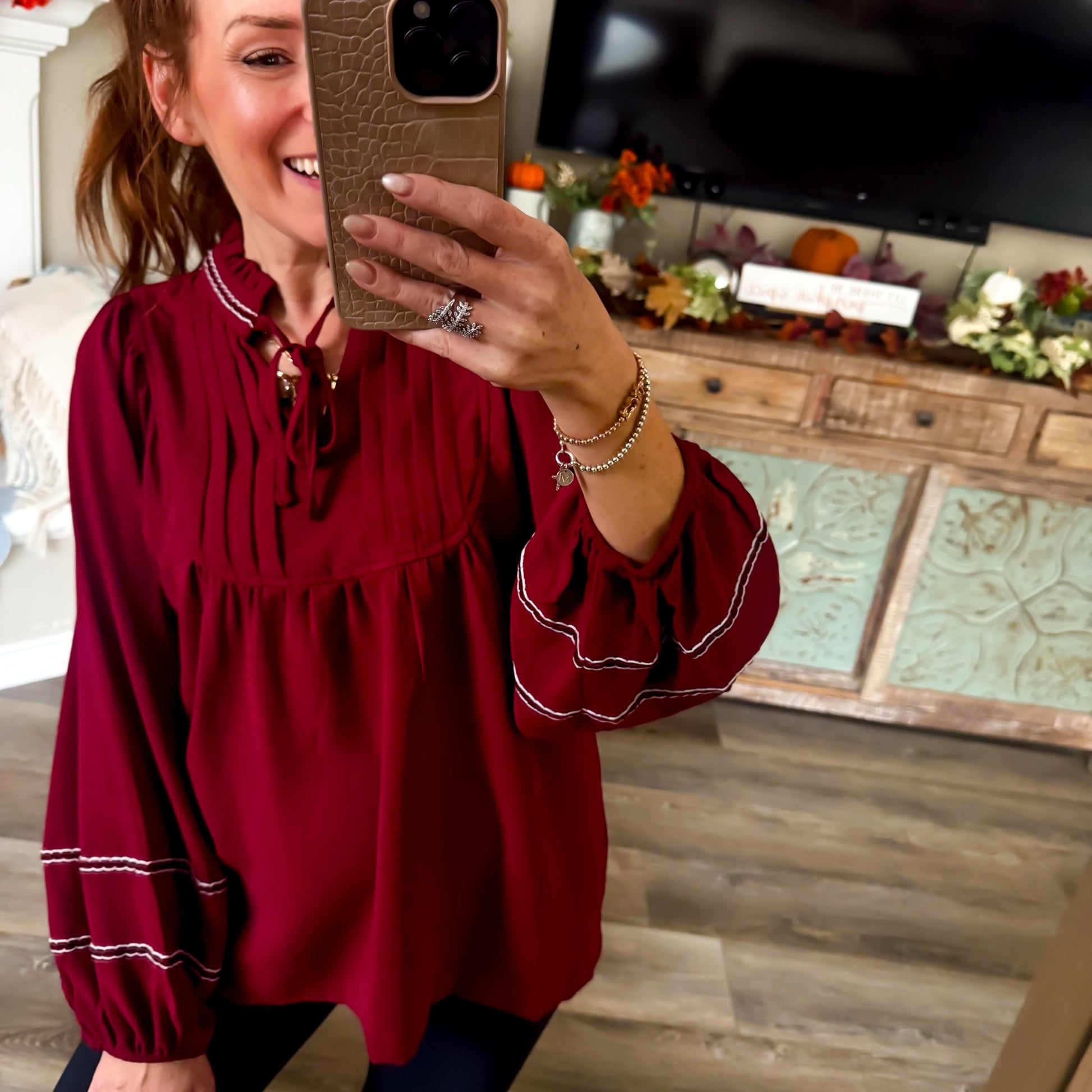 Burgundy babydoll blouse tie neck and pleats