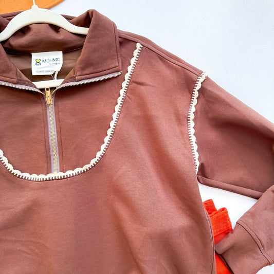 Cocoa quarter zip crochet trim detail