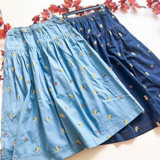 Embroidered daisy denim tiered midi skirt in light and dark denim