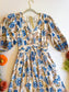 Orchard Sunday Best - 3/4 Sleeve V Neck Border Print Woven Midi Dress With Pockets