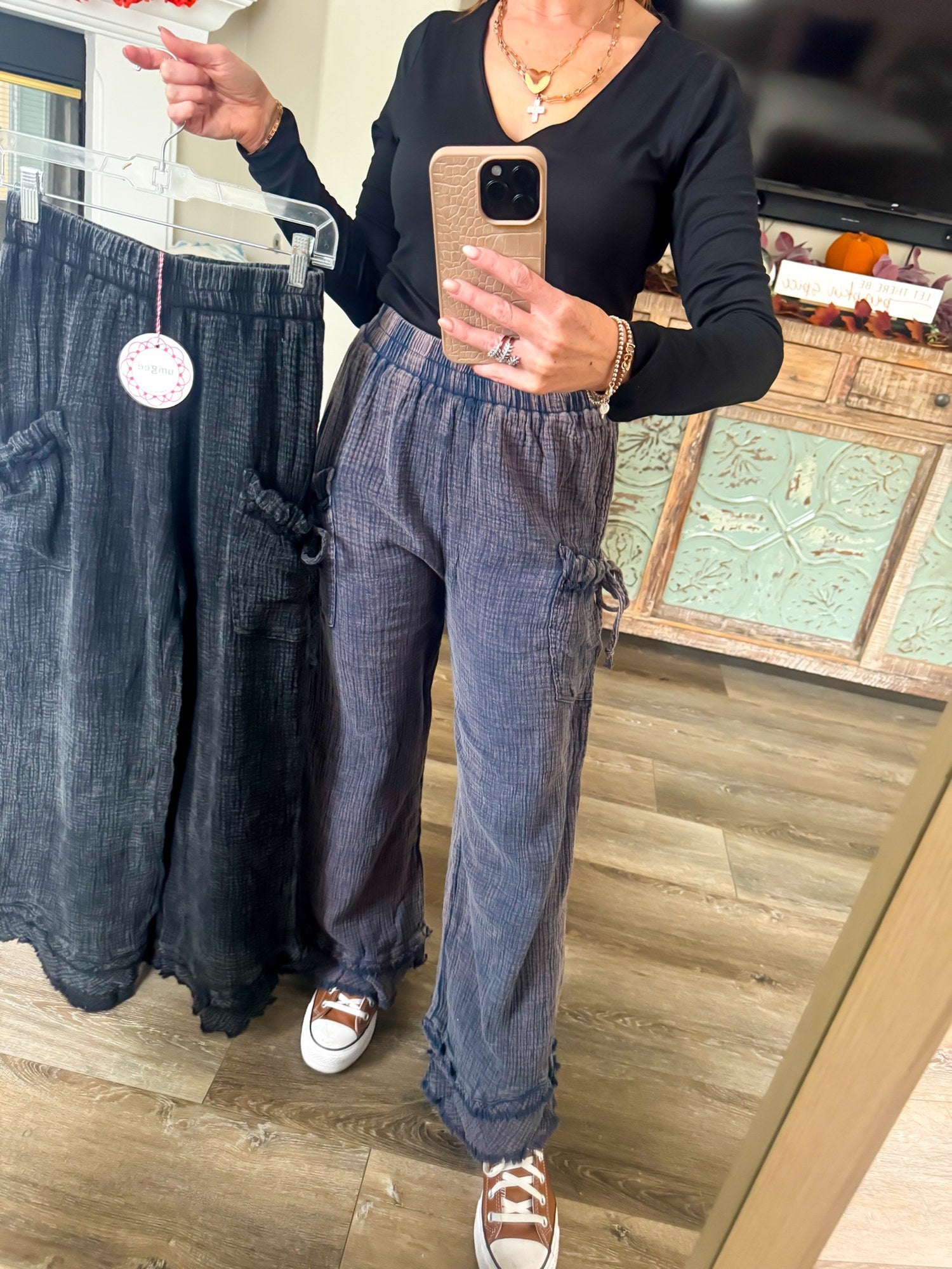 Navy gauze cargo pants styled with black bodysuit