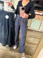 Navy gauze cargo pants styled with black bodysuit