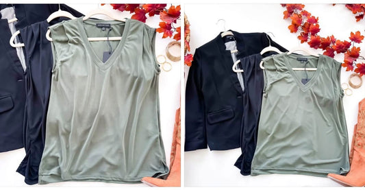 Olive V-neck top styled flat lay