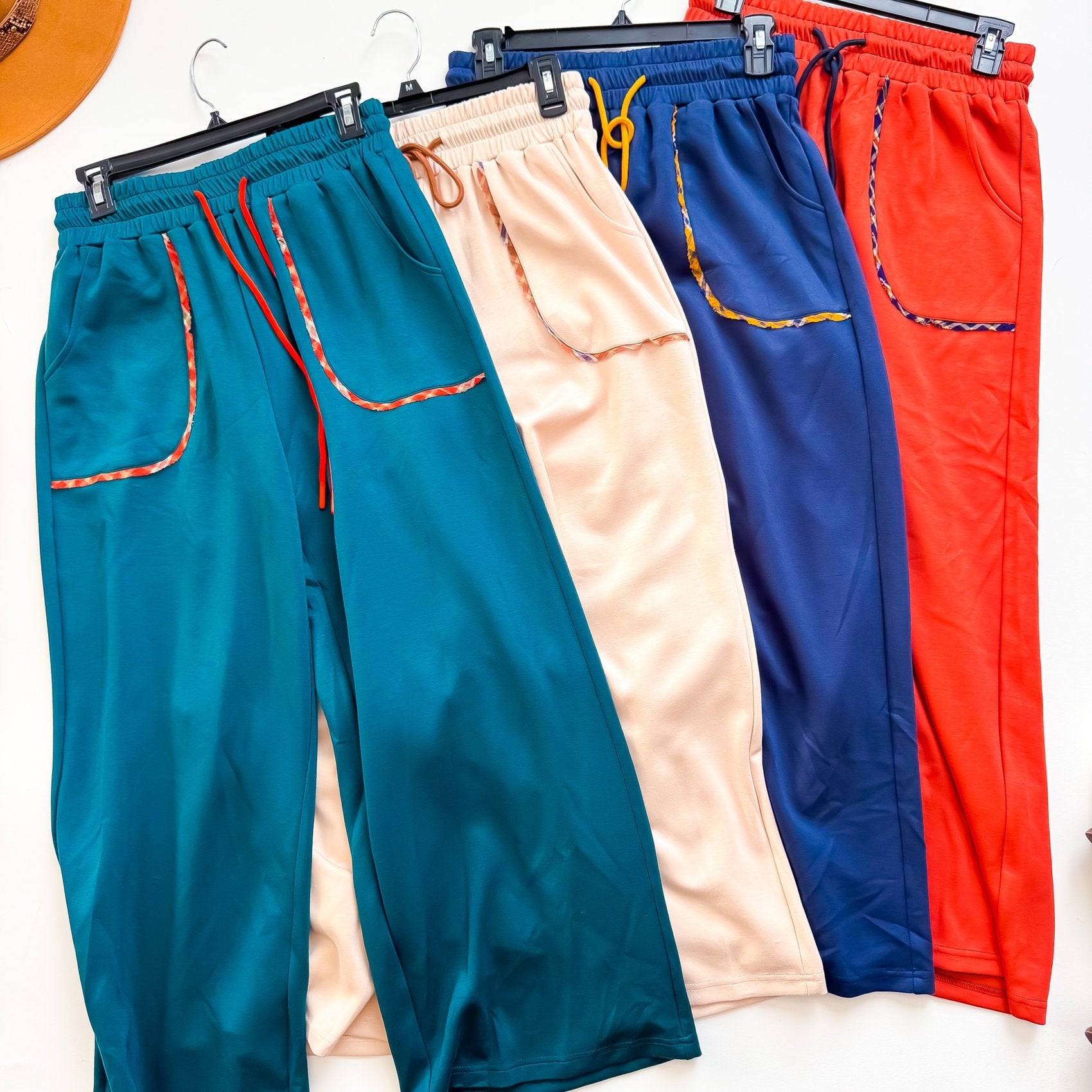 Umgee plaid trim drawstring joggers in teal, cream, navy and spice