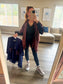Navy poncho styled with brown
