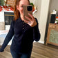 Black ruffle collar polo sweater
