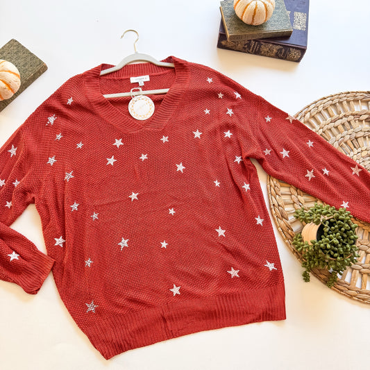 Rust star embroidered V-neck sweater