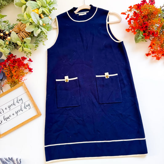 Navy mock neck pocket sweater dress with cream trim