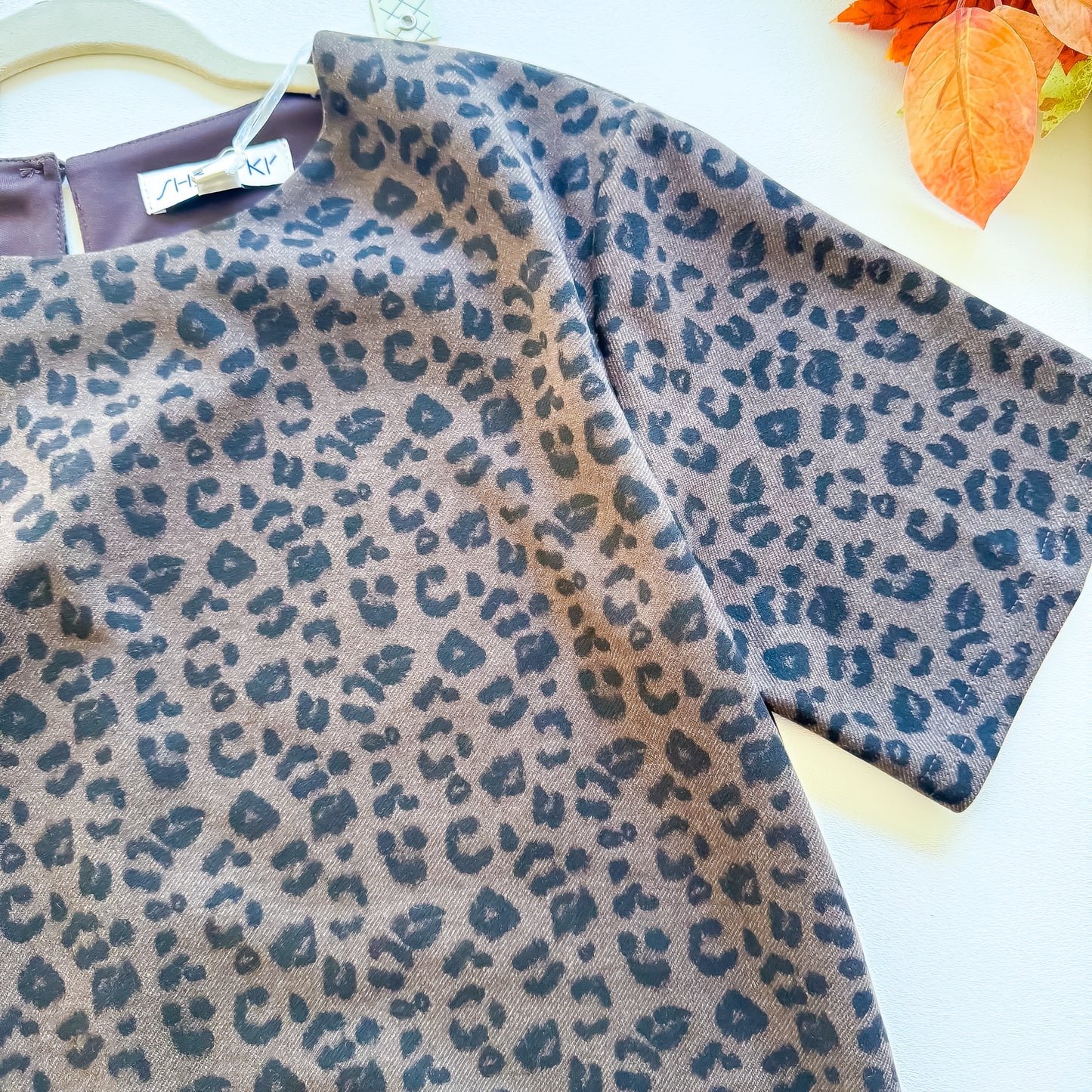 Wild About Fall - Short Sleeve Animal Knit Dress With Pockets