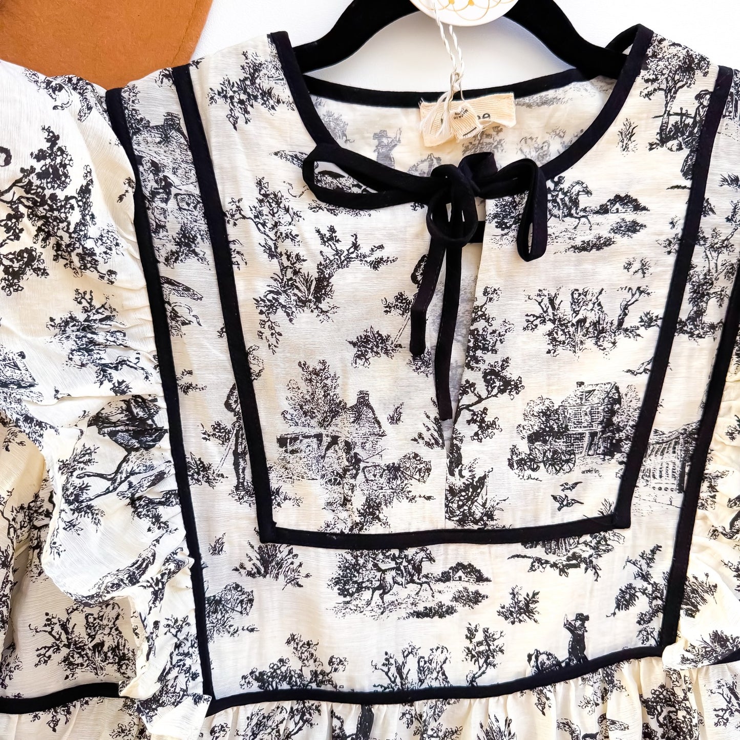 Umgee toile top bib and tie neck detail