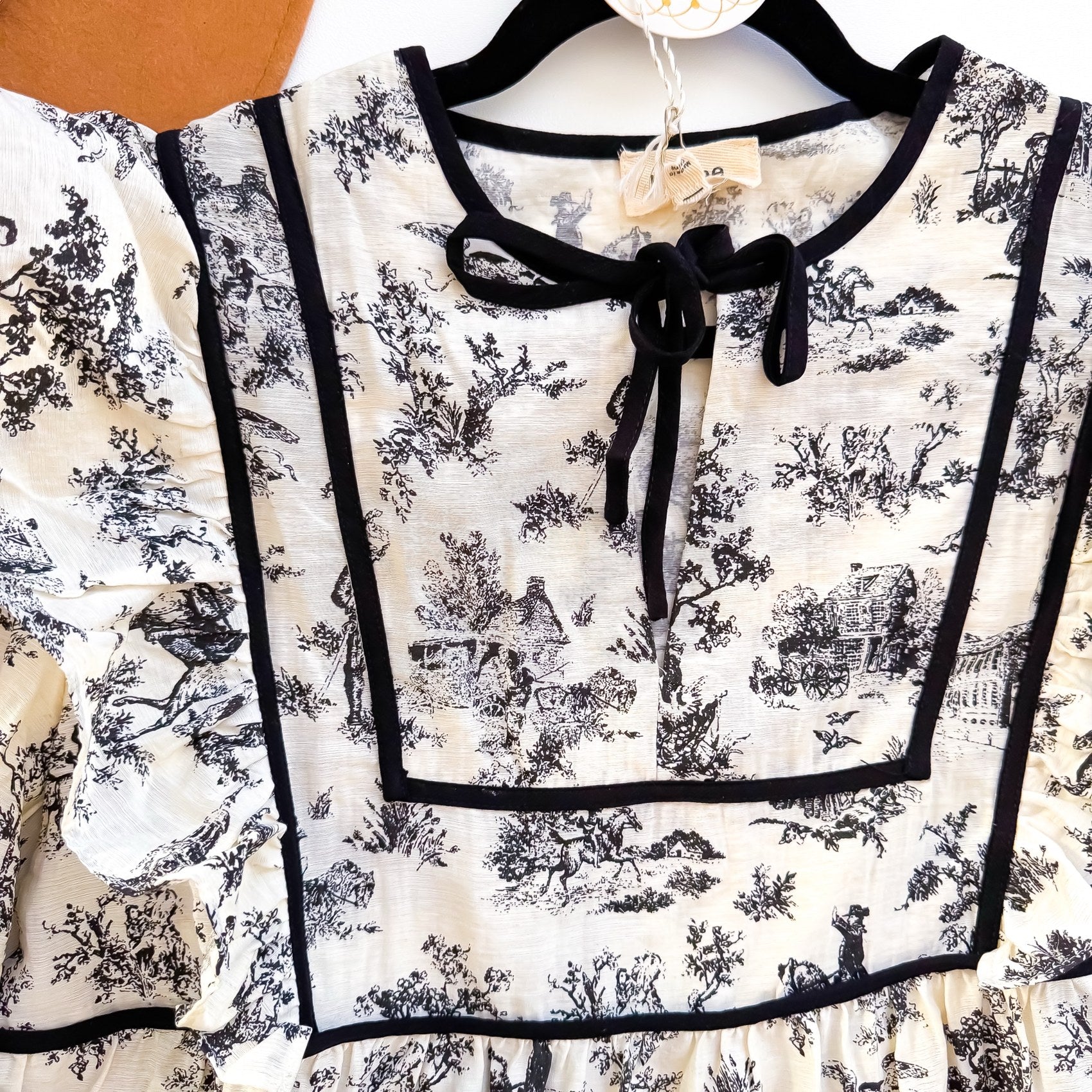 Umgee toile top bib and tie neck detail